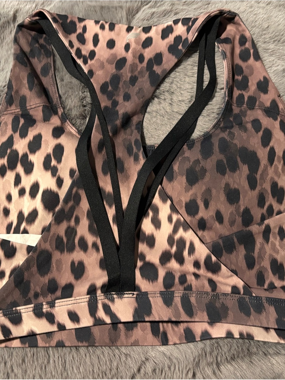Fabletics Leopard-Print Racerback Sports Bra in Brown and Black